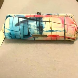 RACHEL Rachel Roy Abstract Rolled Clutch Bag.
